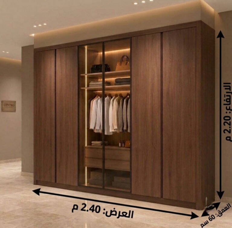 دولاب دريسنج روم خشب بني غامق وأبواب زجاجية مضيئة من تصميم ادم فرنتشر (ADM Furniture)، حلول تخزين داخلية وإضاءة LED مدمجة
